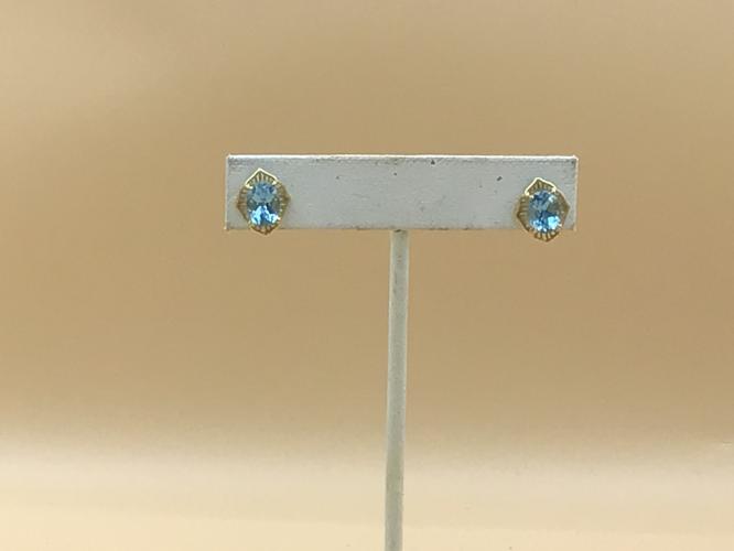 Faceted 8x5mm Blue Topaz 18K Studs by Pat Pearlman <! local>